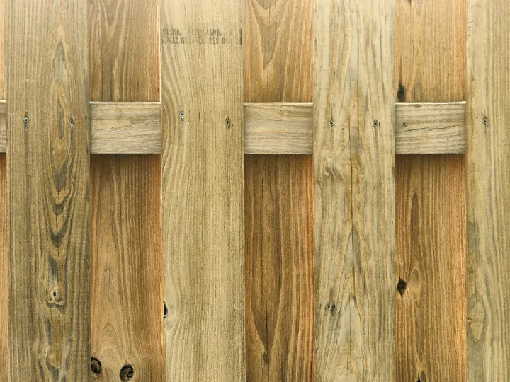 Weathered wooden fence boards